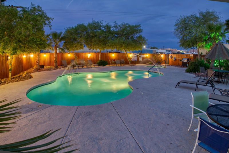 Night time pool and jacuzzi